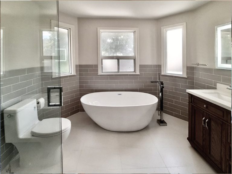 after bathroom reno free standing tub glass shower subway tile vaughan adept services