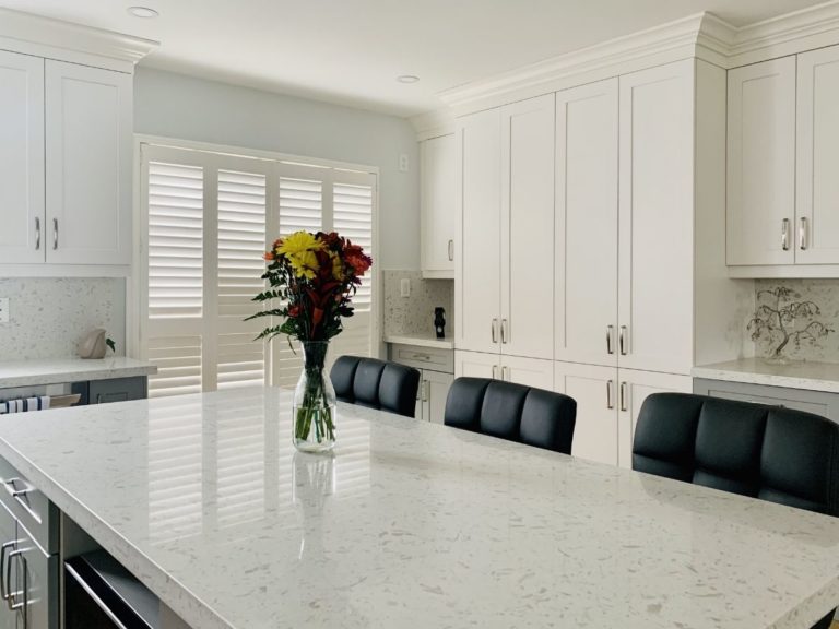 after kitchen reno white grey floor to ceiling cabinets adept services