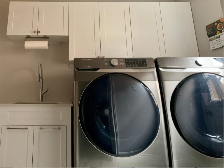 after laundry room reno white cabinets milton adept services